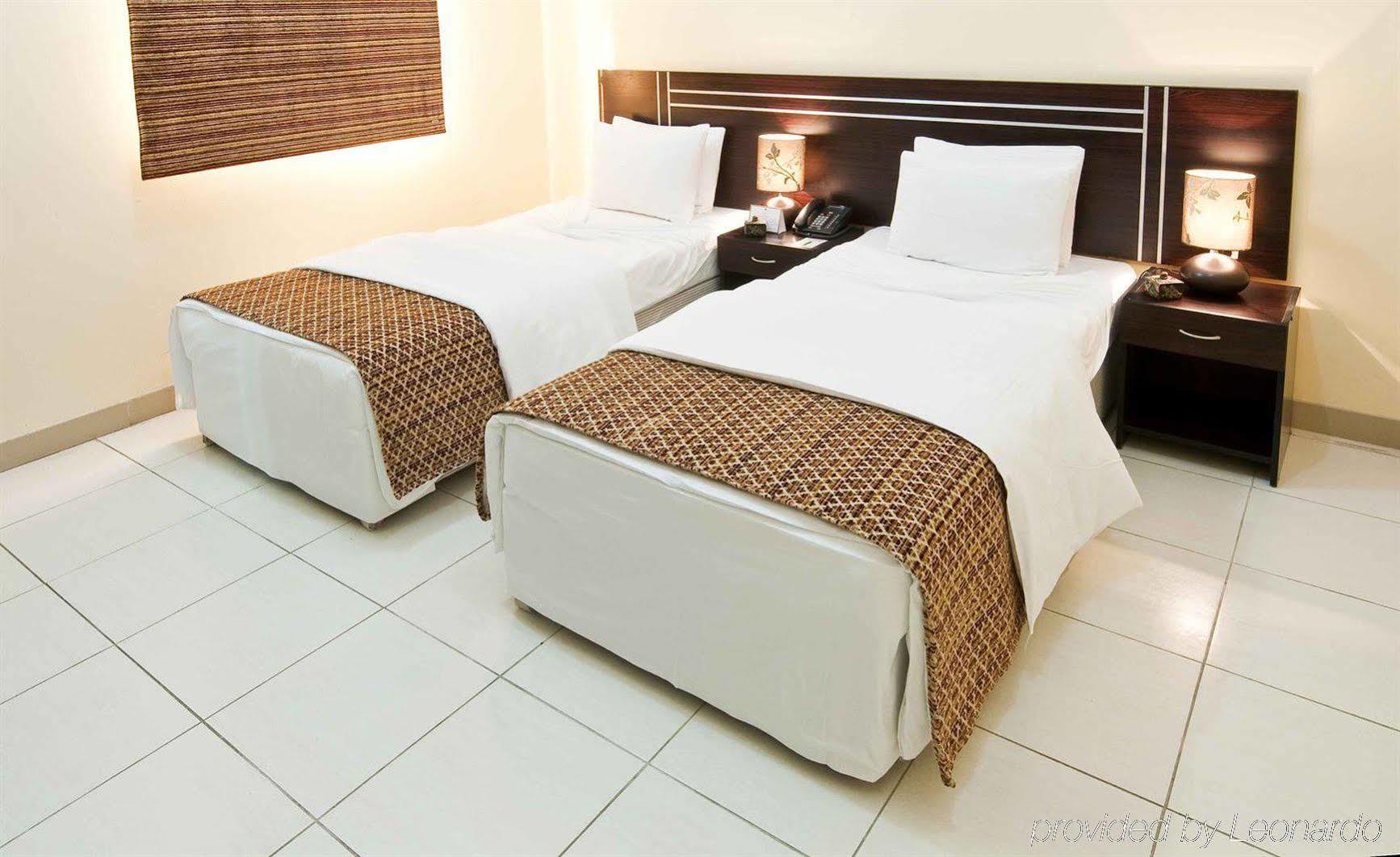 La Villa Hotel Doha Quarto foto