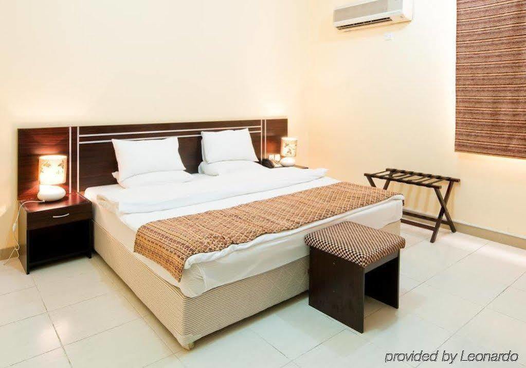 La Villa Hotel Doha Quarto foto